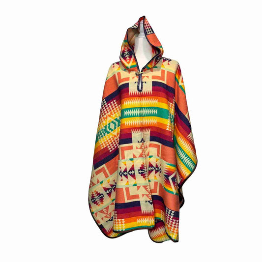Cactus Bloom Fiesta hooded alpaca-blend poncho in orange multi with patchwork geometry, unisex front view