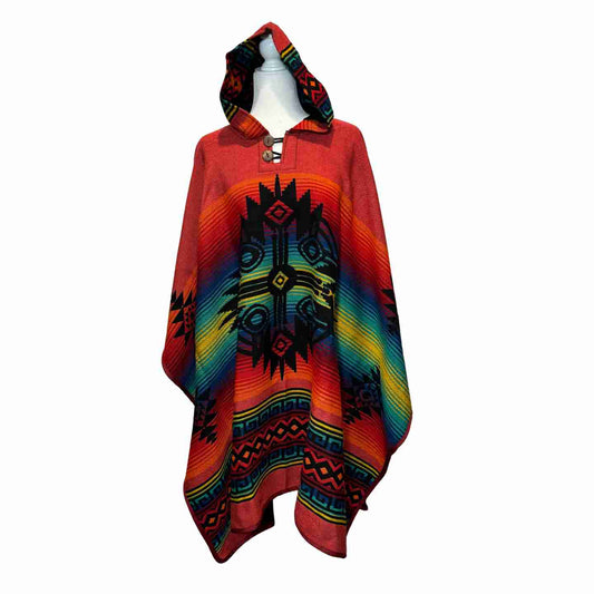 Desert Sunrise Ember hooded alpaca-blend poncho in red with rainbow burst motif, unisex front view