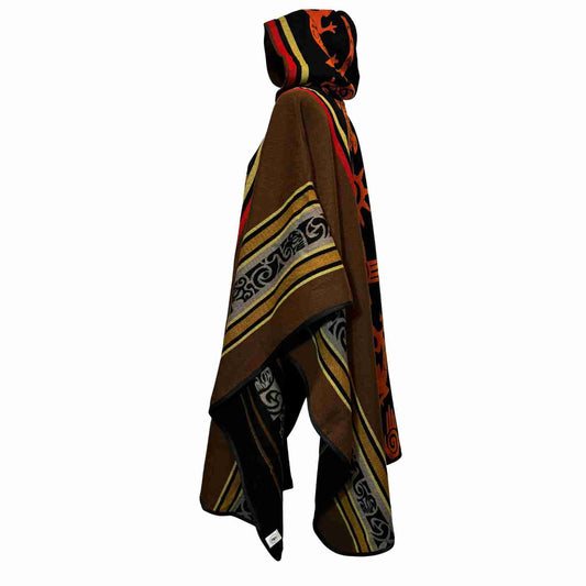 Side angle of brown hooded alpaca poncho with ember and sand border stripes