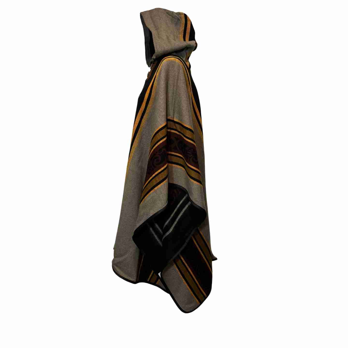 Four Directions Nightfall hooded alpaca-blend poncho in taupe and black, front view with sun and four-directions motif