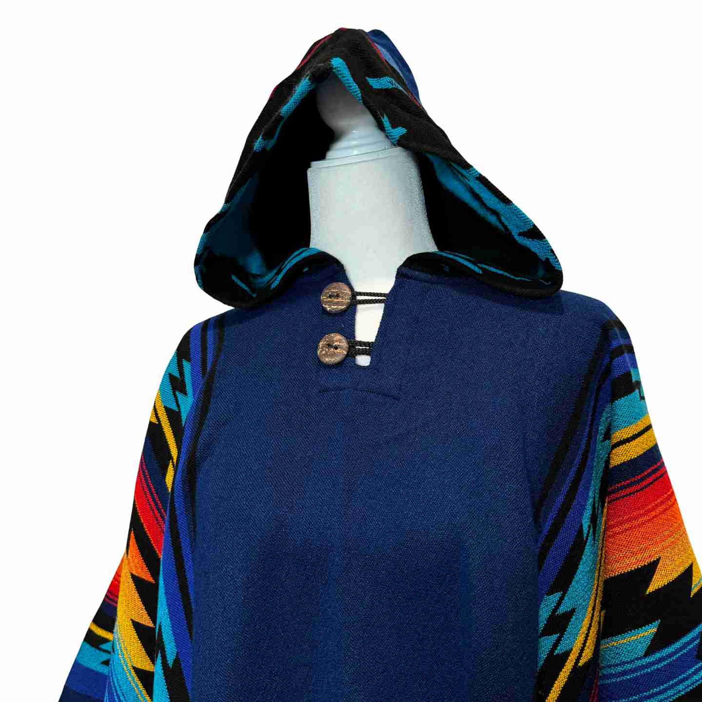 Hood and buttoned neckline detail on Midnight Mesa alpaca-blend poncho