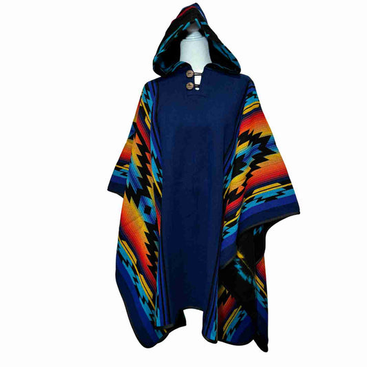 Midnight Mesa hooded alpaca-blend poncho in deep navy with rainbow zigzag
