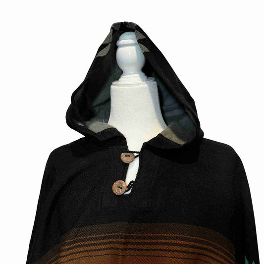 Hood and buttoned neckline detail on Sky Eagle Dusk alpaca-blend poncho