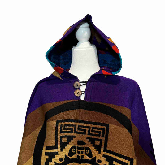 Back view showing soft drape of Sunstone Aura Violet hooded poncho