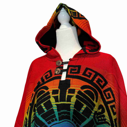 Hood and buttoned neckline detail on Sunstone Spectrum Crimson alpaca-blend poncho