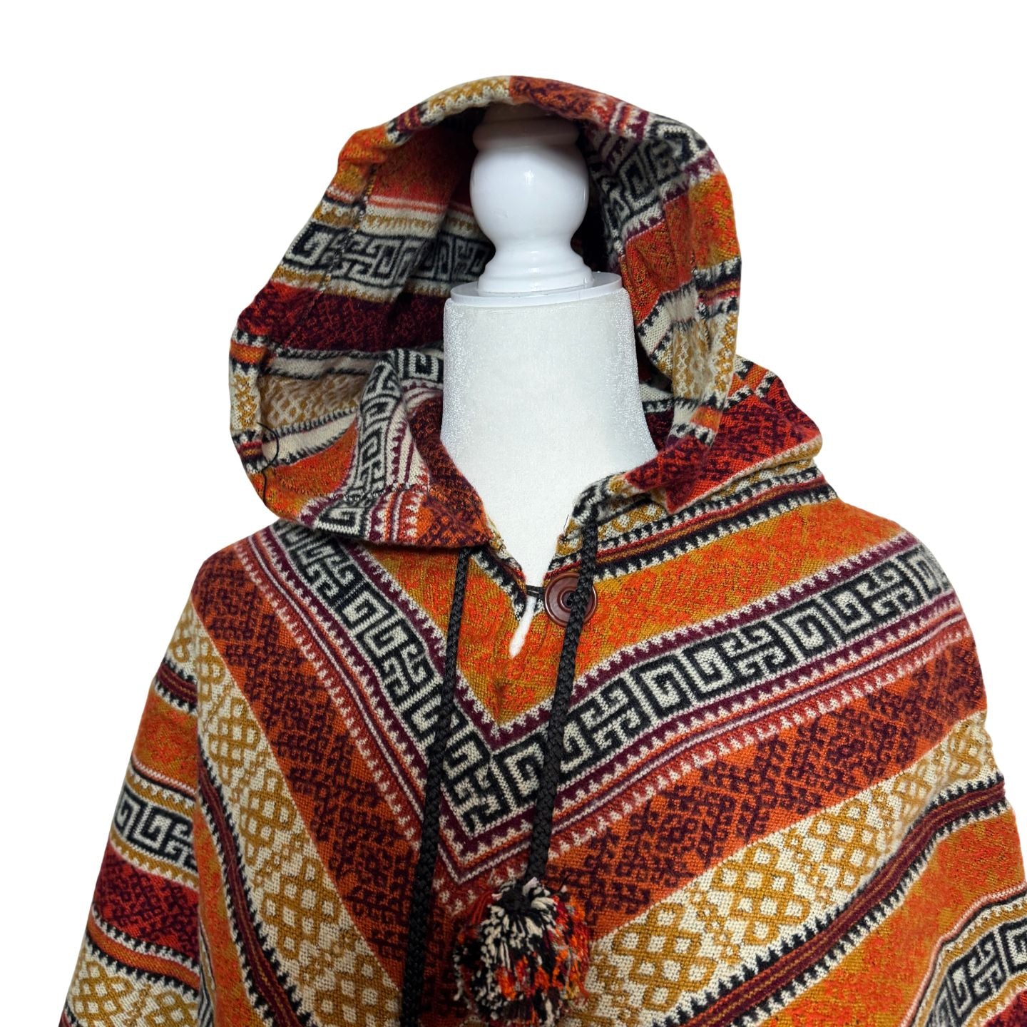 Hooded V-Shaped Poncho with Geometric Stripes & Pom-Poms
